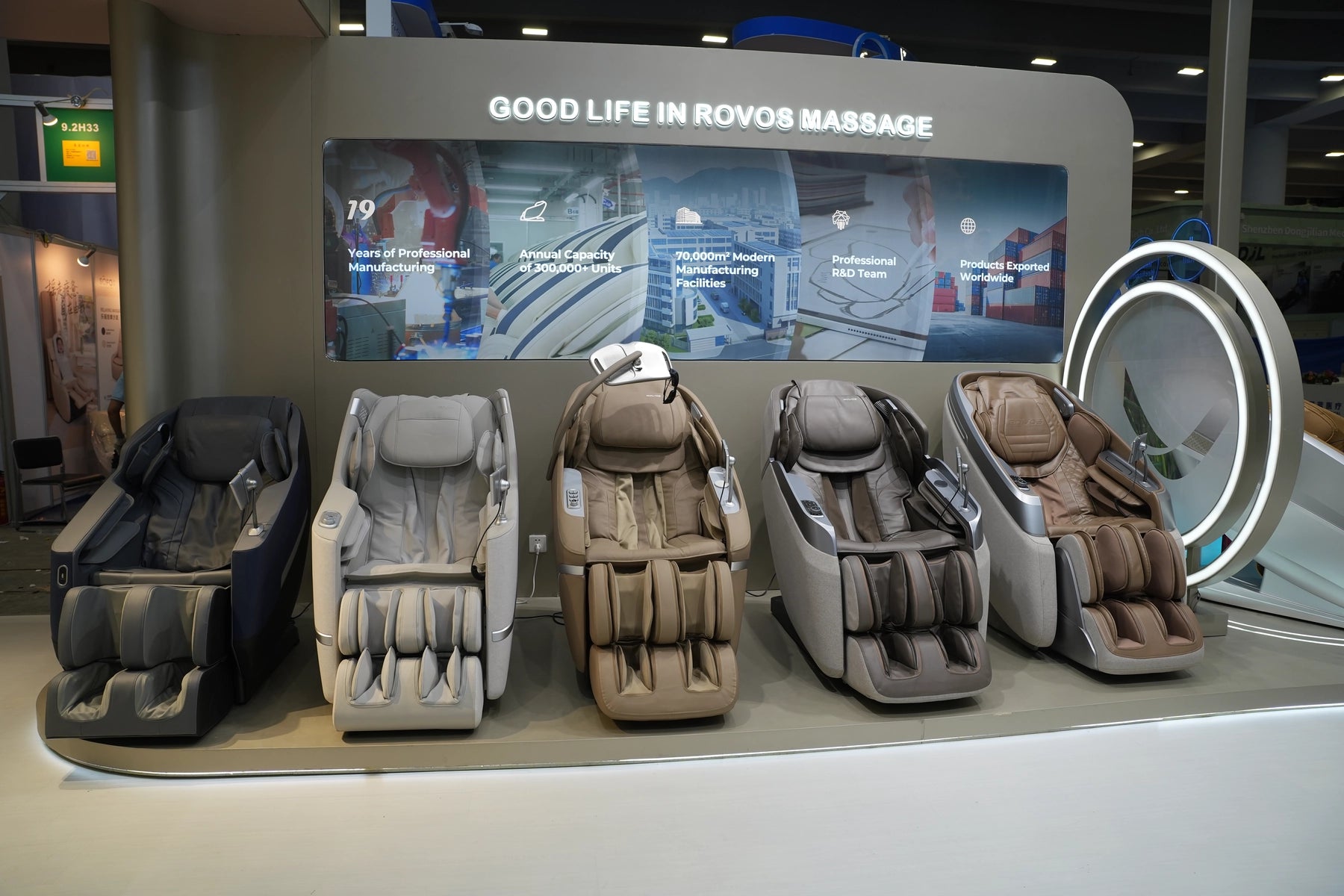Bosscare massage chair product range displayed at exhibition booth